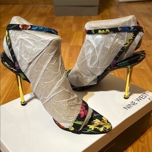 Nine West Black and Gold Heels with Stiletto Design